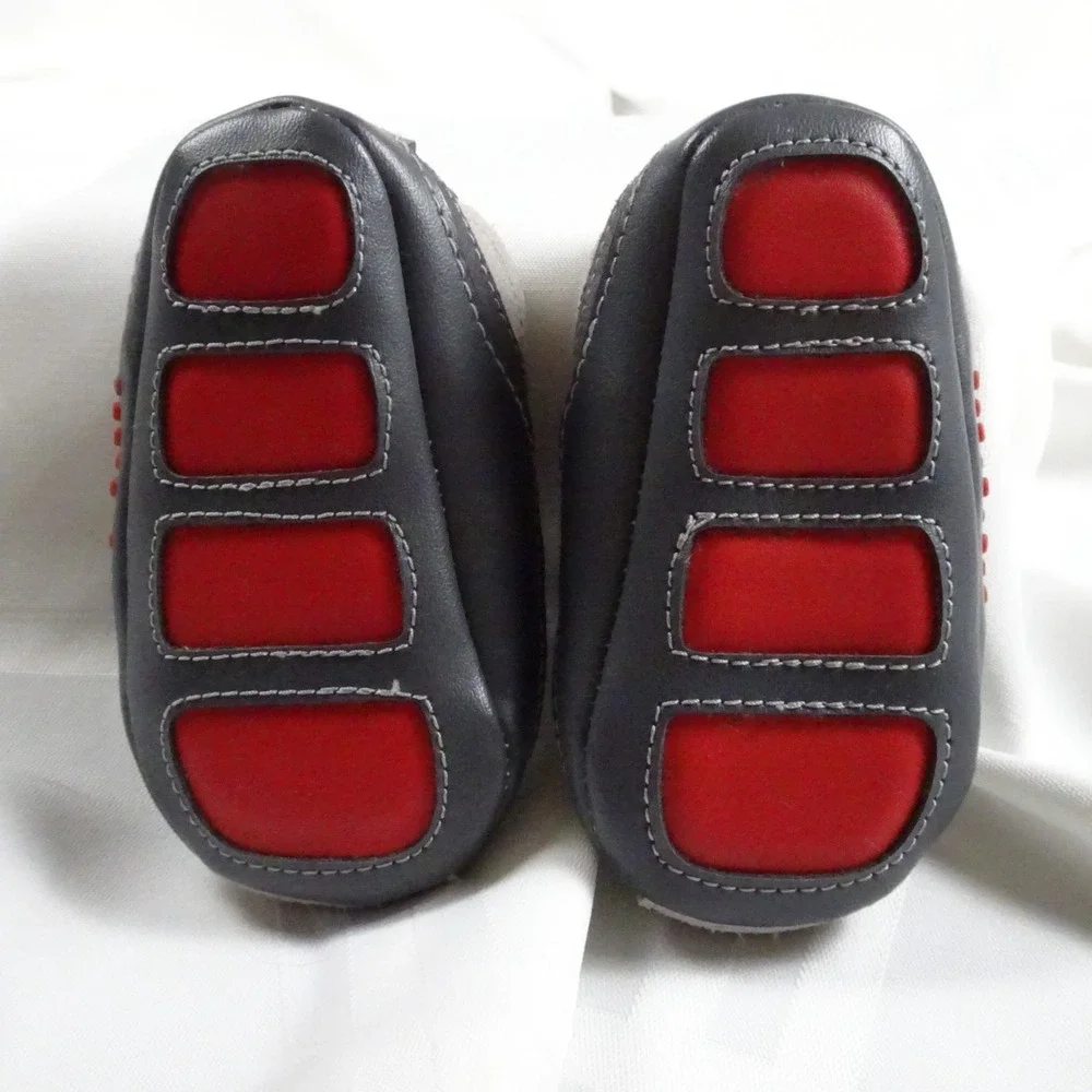 2 Sets Of Vintage Infant shoes. White pair and a Gray/Red pair.
